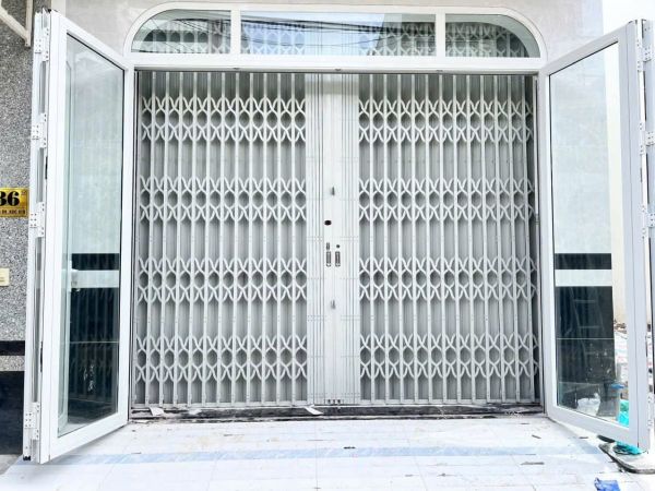 cửa kéo sắt kết hợp cửa kính