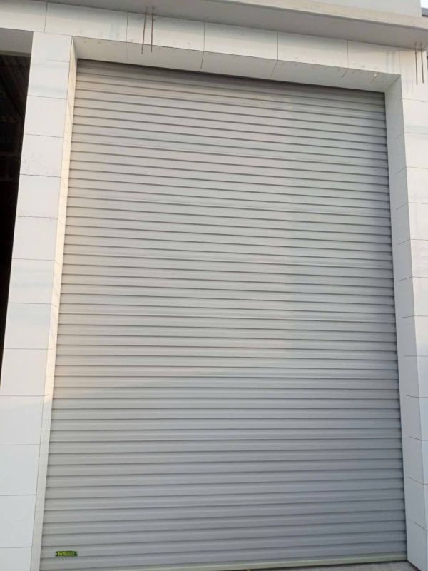 cua-cuon-nha-be-2 Cửa cuốn tấm liền
